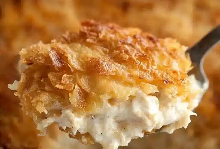 Delicious Chicken Hashbrown Casserole baked with cheese and topped with crispy hashbrowns