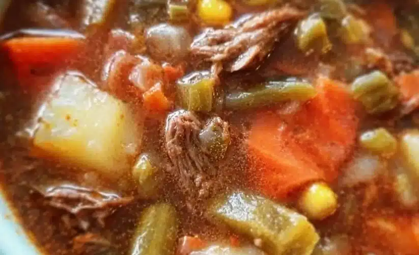 Bowl of My Mom's Old-Fashioned Vegetable Beef Soup with fresh vegetables and beef.