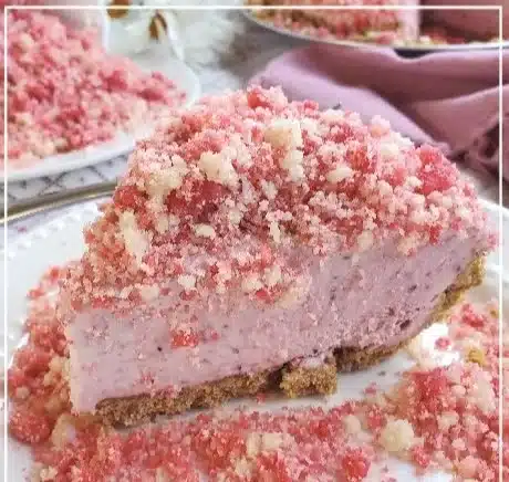 Delicious Strawberry Shortcake Freezer Pie topped with fresh strawberries and whipped cream