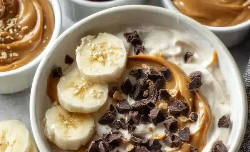 Peanut Butter Yogurt bowls topped with fruits and nuts for a healthy snack.