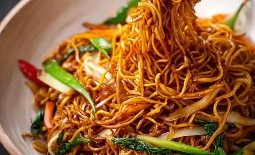 Delicious quick and easy chow mein served in a bowl with colorful vegetables