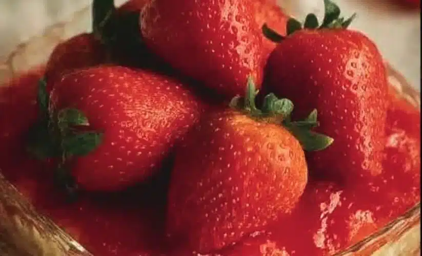 Fresh strawberries in a vibrant Strawberry Heaven dessert bowl.